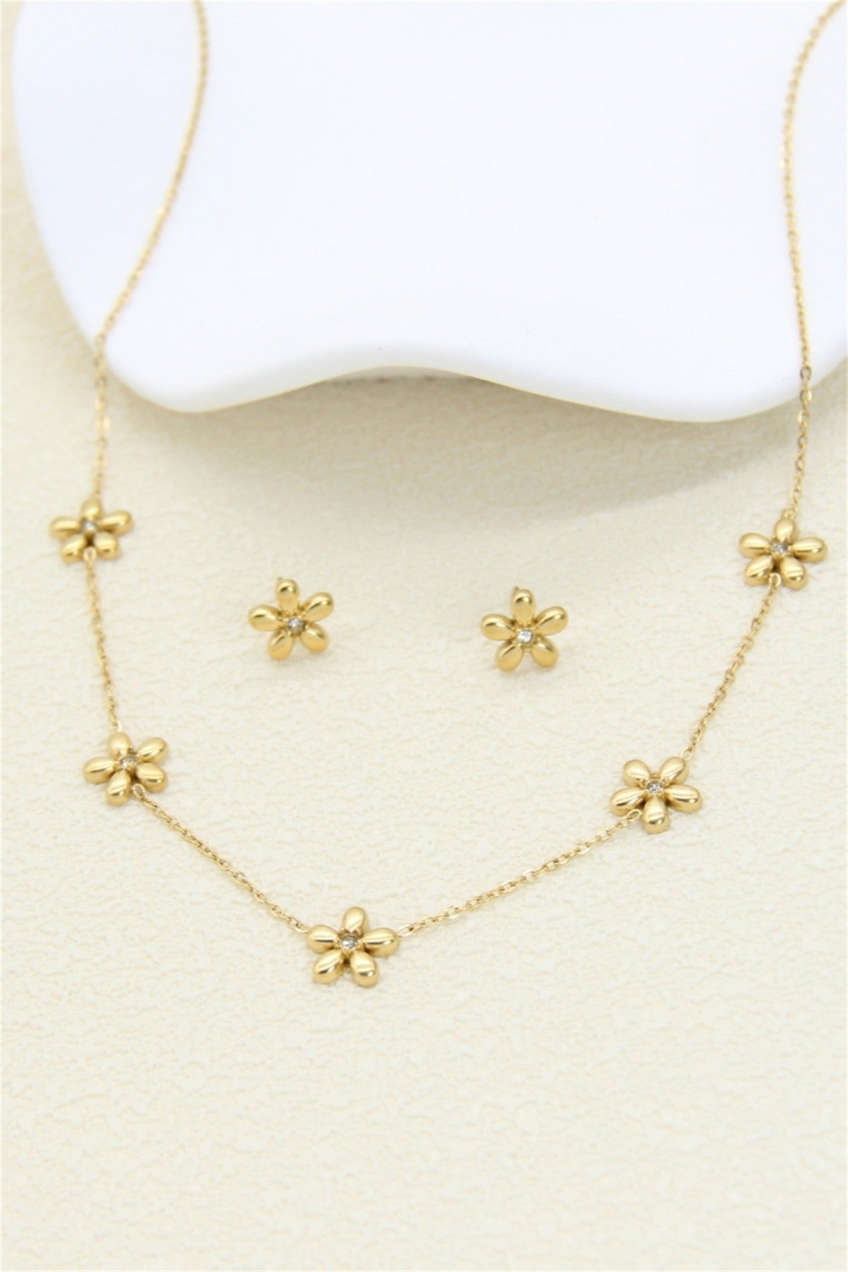 Fleur Éclat – Gouden Ketting & Oorbellen Set